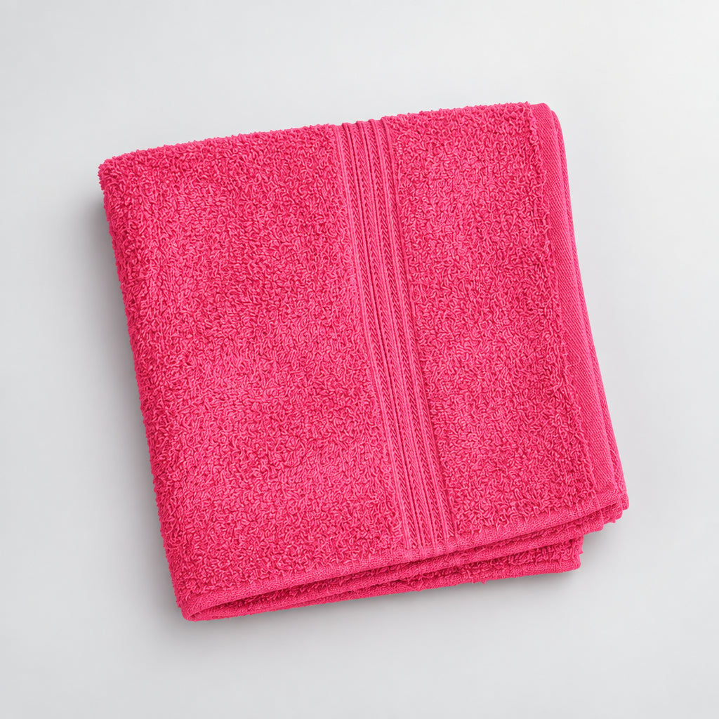 Hot Pink Gym and Face Towel folded on a light background, ribbed stripe detail