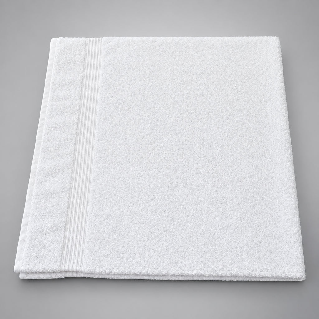 Home Bath Towel in white folded, ribbed border detail