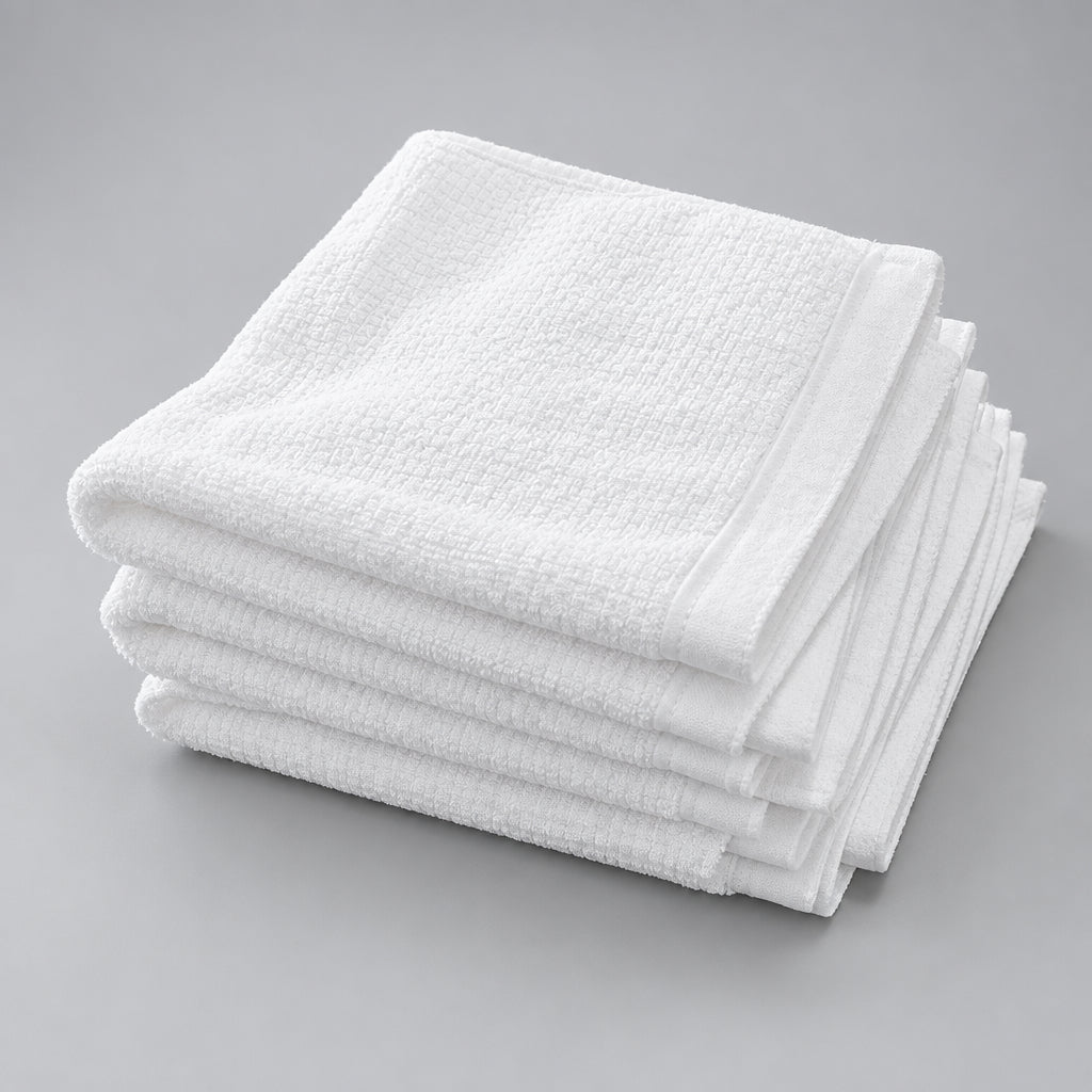 Stack of three folded White Washcloths