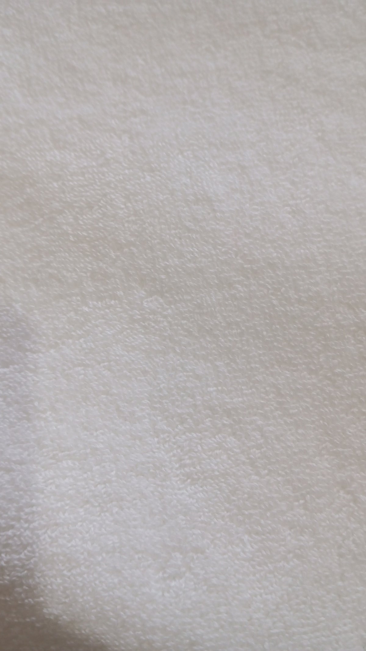 Macro close-up of the Hotel White Bath Towel terry pile