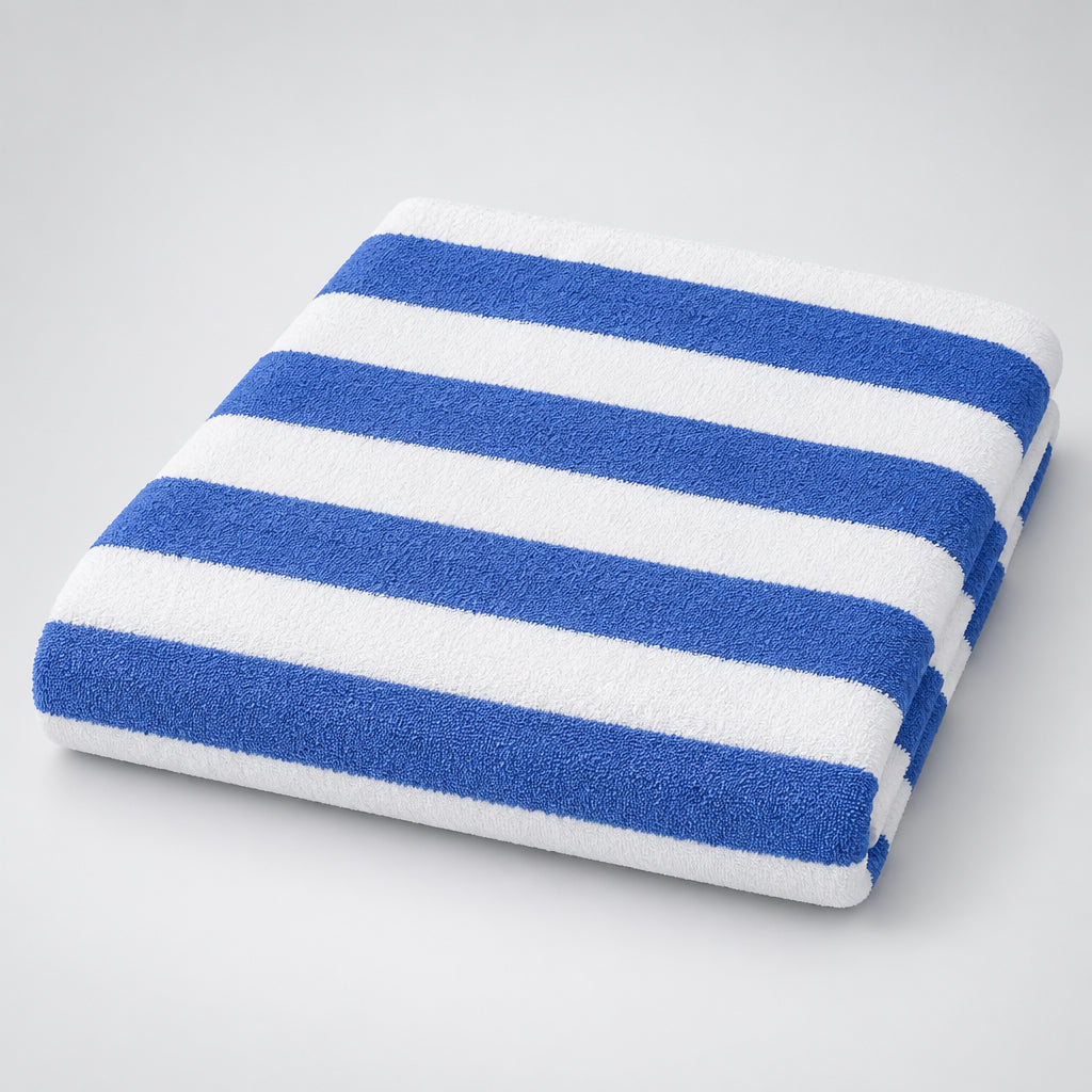 Cabana Stripe Pool Towel folded to show its wide royal blue stripes