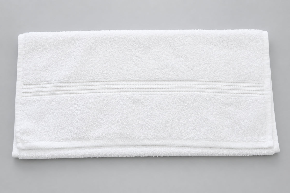 Home Bath Towel in white folded, central ribbed stripe
