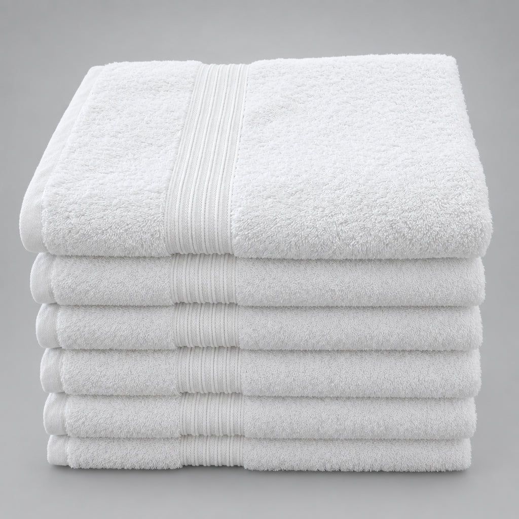 Stack of white Home Bath Towels with ribbed band detail
