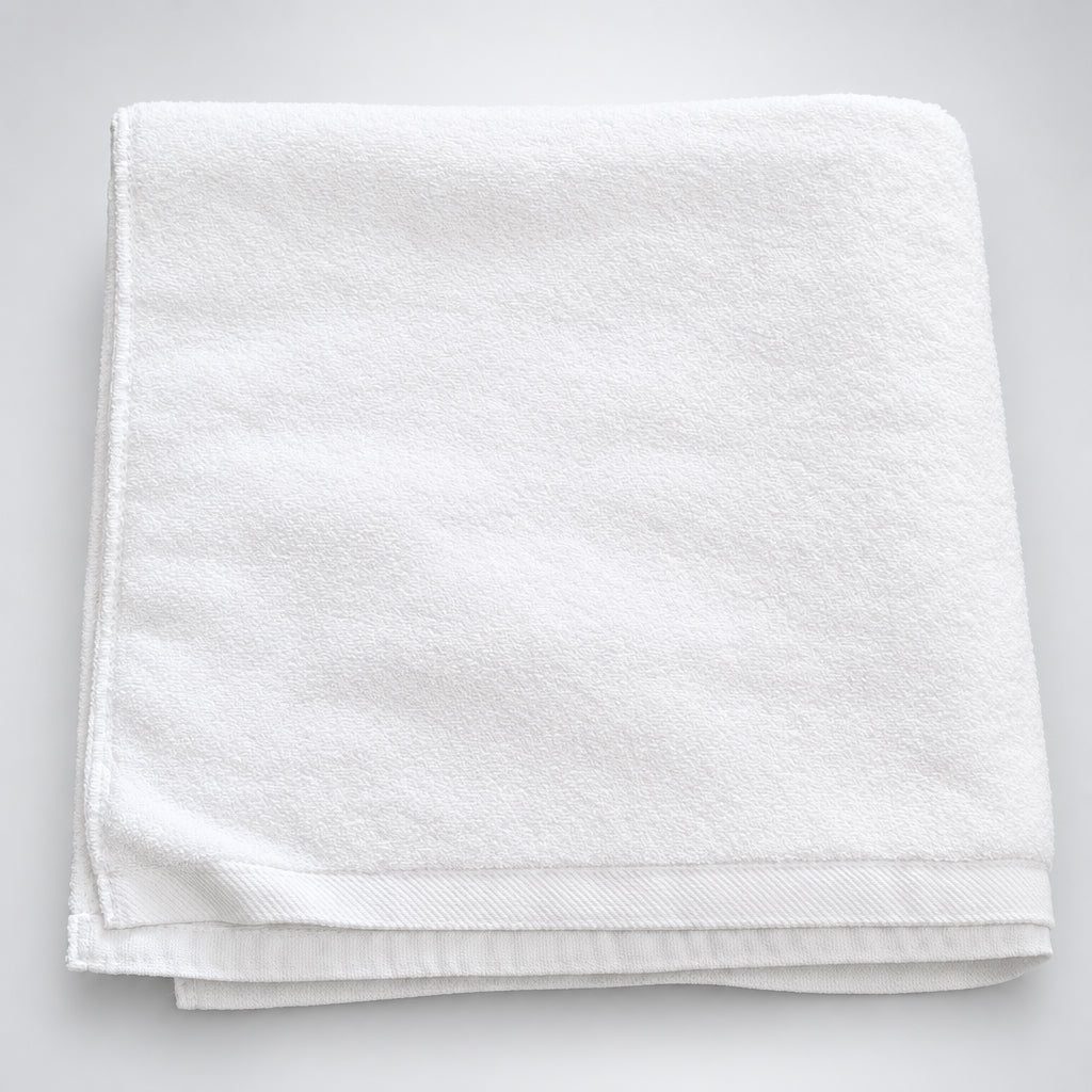 Hotel White Bath Towel folded, corner detail