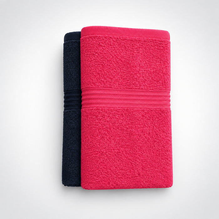 Everyday Gym and Face Towels in Hot Pink and Slate Blue, folded and stacked