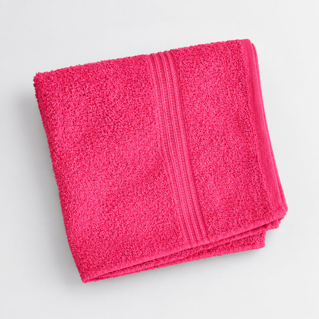 Hot Pink Gym and Face Towel folded, showing the stitched border stripe